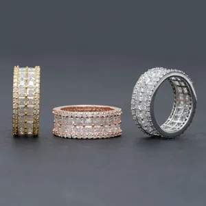 Close-up of 925 silver hip-hop eternity rings with princess cut Moissanite stones.
