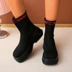 Fashionable black fly-knit platform sock boots for women with red stripe detailing