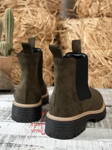 Detail view of women's olive green suede Chelsea boots with 4.5cm chunky platform sole