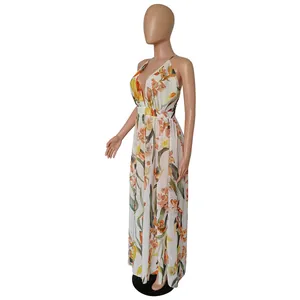 Floral chiffon maxi dress with deep V-neck and elegant flowy silhouette on mannequin.