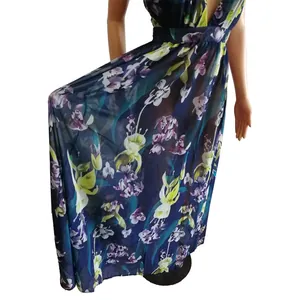 Detail of deep V-neck backless floral chiffon maxi dress with elegant purple prints