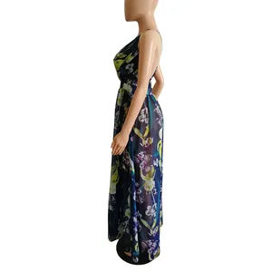 Side view of backless floral chiffon maxi dress with deep V-neck detail shown on mannequin.