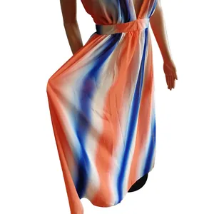 Deep V-neck backless chiffon maxi dress featuring vibrant orange and blue gradient pattern