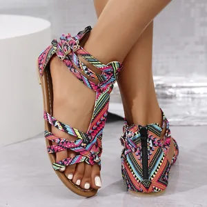 Detailed macro view of Bohemian Roman sandals featuring vibrant colorful geometric straps
