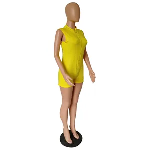 Yellow sleeveless romper with all-over rhinestone embellishments and front zipper detail