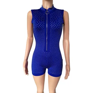Detail of royal blue sleeveless jumpsuit featuring silver rhinestones and front zipper