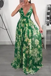 Elegant green floral chiffon maxi dress with deep V-neck and halter backless design.