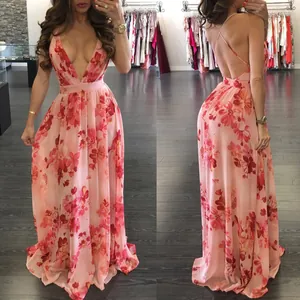 Detailed view showing the deep V-neck and open back of this floral chiffon maxi dress.
