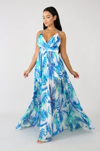 Full view of elegant deep V-neck chiffon maxi dress with blue tropical leaf print