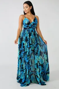 Elegant deep V-neck backless chiffon maxi dress featuring a blue tropical leaf print