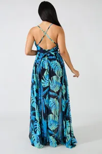 Back view of a Bohemian tropical print chiffon maxi dress with cross-straps