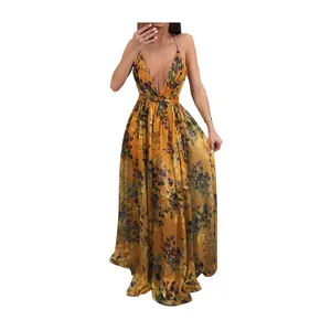 Detail view of yellow floral chiffon dress with deep V-neck and backless design