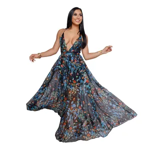 Full length view of a flowing deep V-neck floral chiffon maxi dress on a model