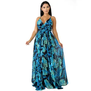 Full-length view of a tropical leaf print deep V-neck chiffon maxi dress in blue