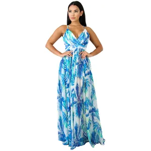 Close-up of the flowy blue tropical palm print on this deep V-neck backless chiffon maxi dress
