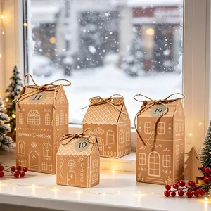 Gingerbread house kraft paper gift boxes on a snowy windowsill with warm fairy lights