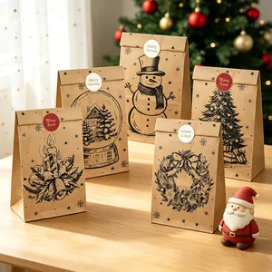 Détails des sacs cadeaux en papier kraft brun avec illustrations et autocollants de Noël