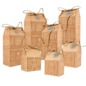 Variedad de cajas de regalo de papel kraft con forma de casita de jengibre de Navidad