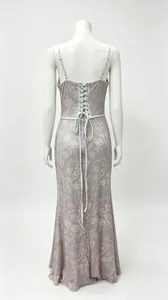 Back view of floral print maxi dress with lace-up corset detail on mannequin.