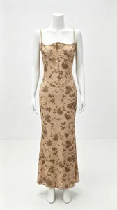 Full view detail of a beige floral corset maxi dress displayed on a white mannequin