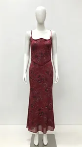 Elegant burgundy floral maxi dress with corset bodice and thin suspender straps