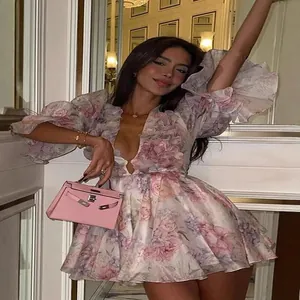 Elegant floral V-neck puff sleeve mini dress for women with a romantic chic style.