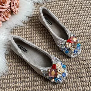 Elegant grey velvet slip-on flats with colorful rhinestone and gem embellishments