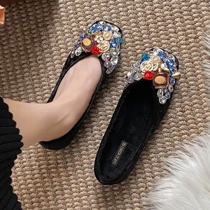 Elegant black velvet flats featuring vibrant rhinestone and pearl charms for women's wear