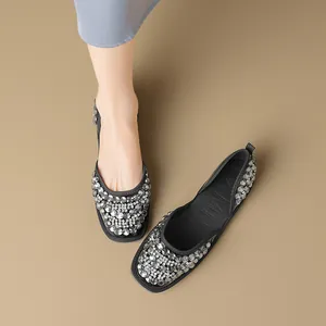 Eleganti scarpe basse nere da donna con strass scintillanti e design traforato