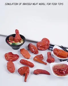 Detailed view of assorted realistic simulation braised meat food toy models
