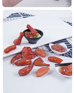 Detailed macro view of realistic miniature braised meat food models for pretend play