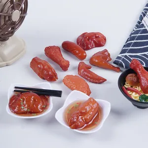 Realistic miniature braised meat models including chicken wings and pig trotters for toys.