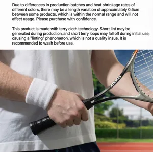 White terry cloth sports wristband for tennis, providing sweat absorption and support.
