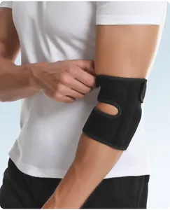Close-up of black adjustable sports elbow brace with breathable spring support on arm.