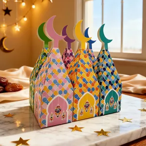 Detail view of colorful Eid moon gift boxes with mosaic patterns and lantern icons