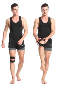 Close-up of a model wearing a professional black adjustable patella strap support