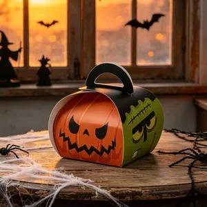 Detail of Halloween candy box with pumpkin and Frankenstein graphics on wooden table