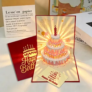 3D pop-up verjaardagskaart met een lichtgevende taart en warm, sfeervol lichteffect.