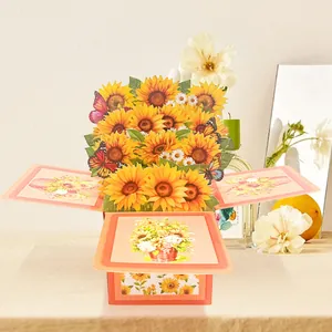 Handmade 3D pop-up sunflower bouquet greeting card with butterfly paper carving design