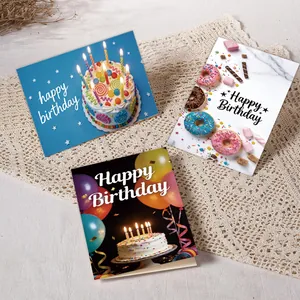 Drei verschiedene Happy Birthday Grußkarten mit Torten- und Donut-Motiven auf Spitzenuntergrund