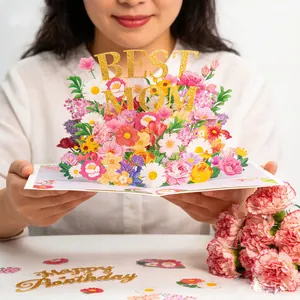 Detail of 3D pop-up floral card featuring golden glitter Best Mom lettering for gift