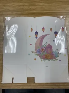 Detailed flat-lay of Ramadan moon star gift box with floral pattern and lantern motif