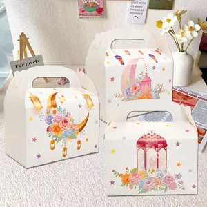 White gift boxes with moon stars and floral designs for Middle Eastern festivals