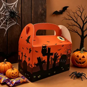 Caja de dulces de Halloween naranja con motivos de cementerio y decoración festiva