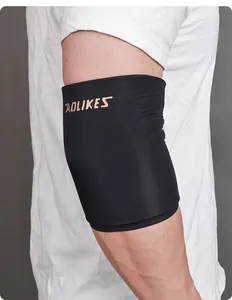 Close-up view of black AOLIKES sports elbow sleeve worn on arm for muscle injury recovery