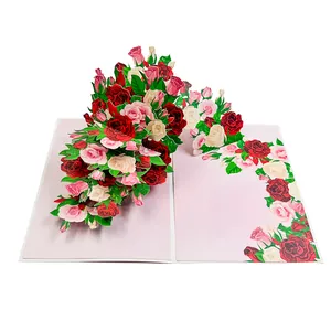 Detailed view of a handmade 3D pop-up greeting card featuring a vibrant rose bouquet.