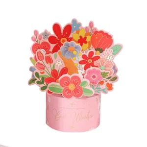Colorful 3D pop-up flower bouquet greeting card in a pink base with Best Wishes text