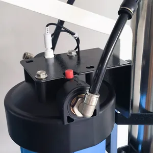 Close-up of a 3-stage RO window cleaning and car washing system filter head assembly.