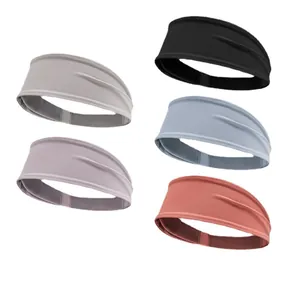 Set of wide sports headbands in five colors for yoga, running, and fitness training