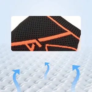 Breathable black and orange knitted compression wrist brace for fitness and sports
